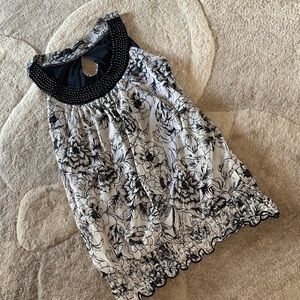 Maurices Black and White Floral Top with beaded neckline size small